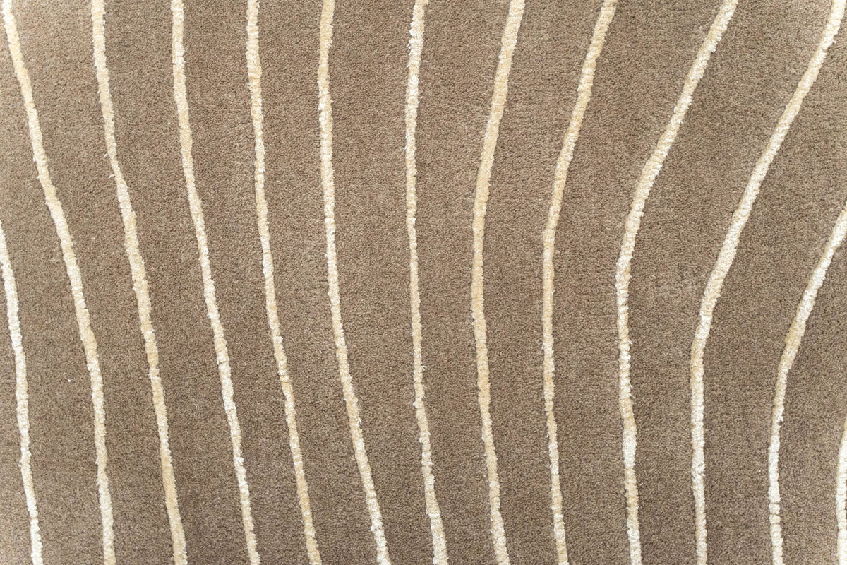 Crinkle Wool & Silk Rug close up, hand tufted New Zealand wool and Botanical Silk with a creased, tactile surface.