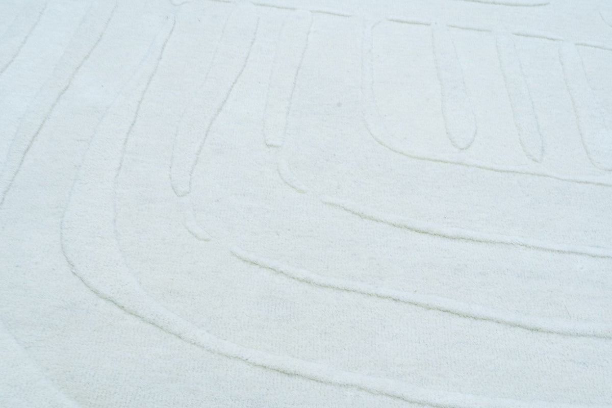Ivory Wool Rug close up, handloom New Zealand wool in a soft ivory.