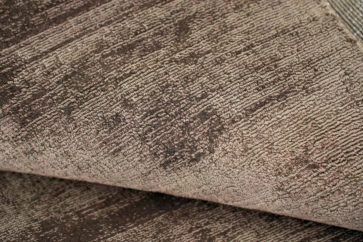 Nuva Silk Rug in Chocolate close up, handloom Botanical Silk with a deep brown sheen.