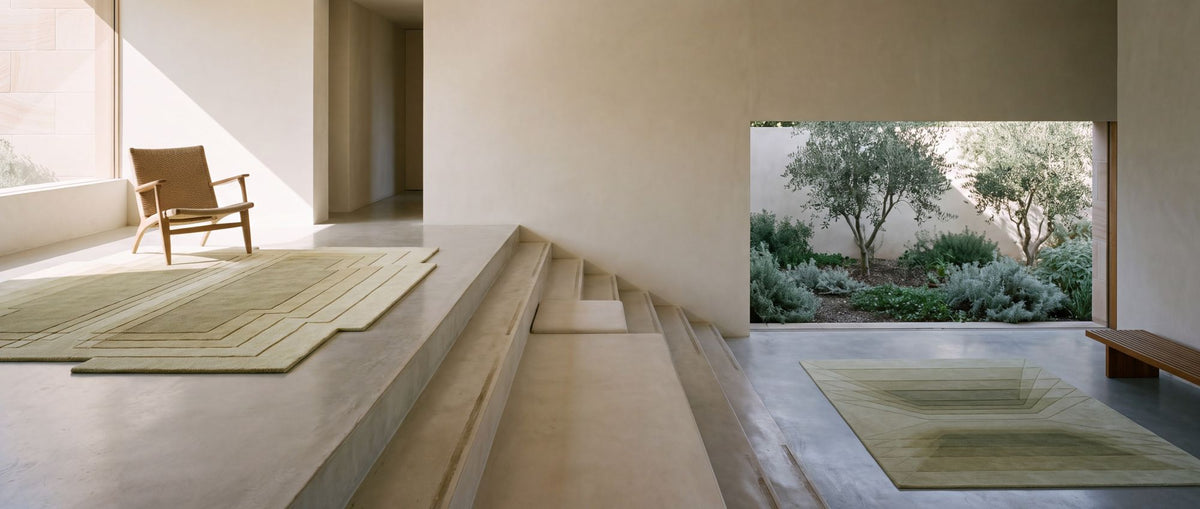 Lamina carved wool rugs on three levels of a stepped house, hand tufted New Zealand wool in sage and sand.