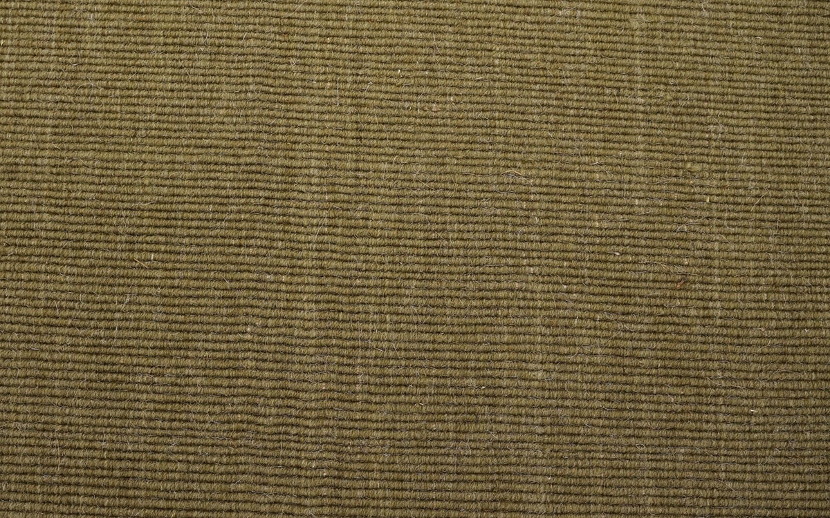 Cabra Wool & Jute Rug in Olive close up, a fine ribbed handloom weave of New Zealand wool and jute.