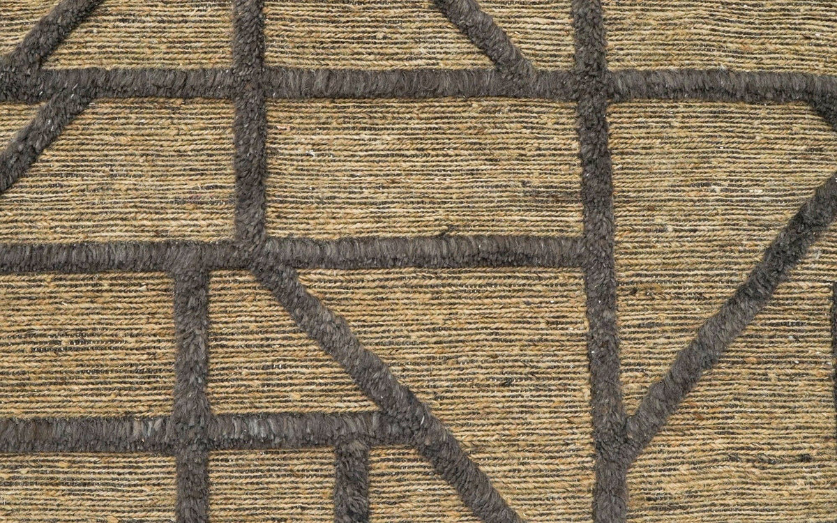 Pazo Knotted Rug close up, hand knotted New Zealand wool in olive tan with raised charcoal lines.