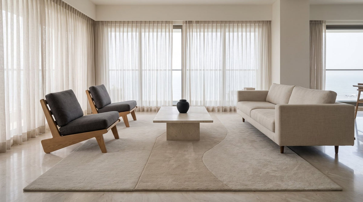 Cadence Wool Rug, hand tufted New Zealand wool in stepped ivory bands, under a full seating group.