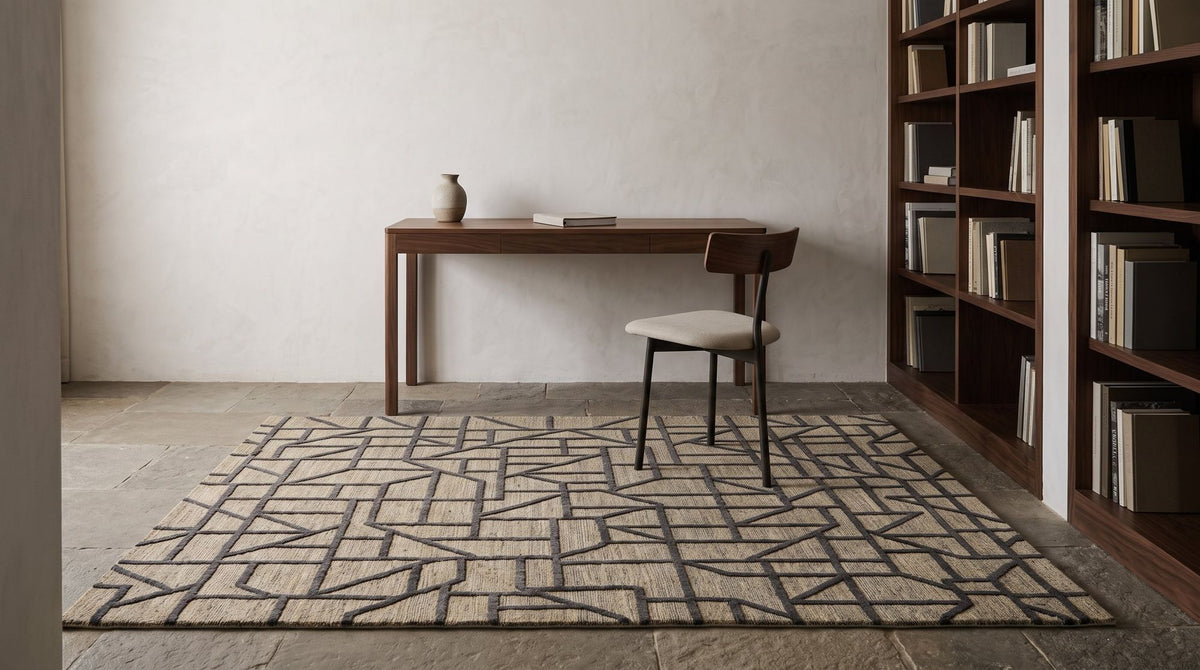 Pazo Knotted Rug, hand knotted New Zealand wool with raised charcoal lines, in a study. Room is a digital render; the rug is from a product photo.