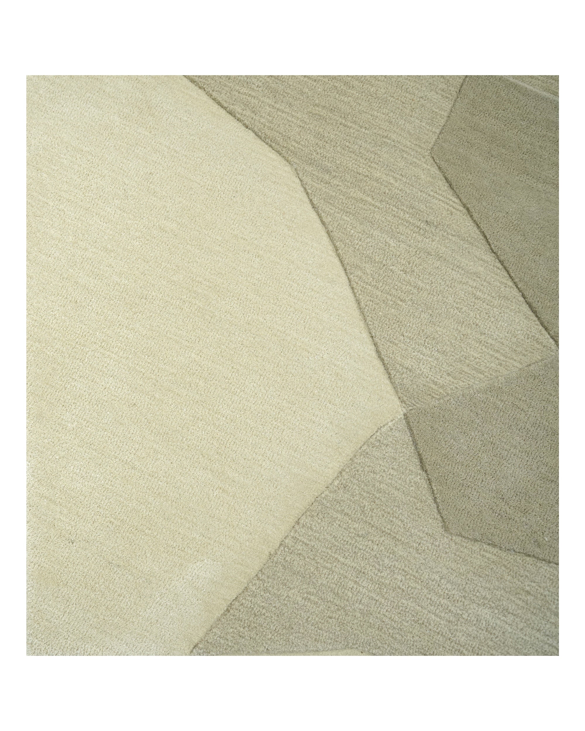 Facet Wool Rug, faceted planes hand-tufted in New Zealand wool