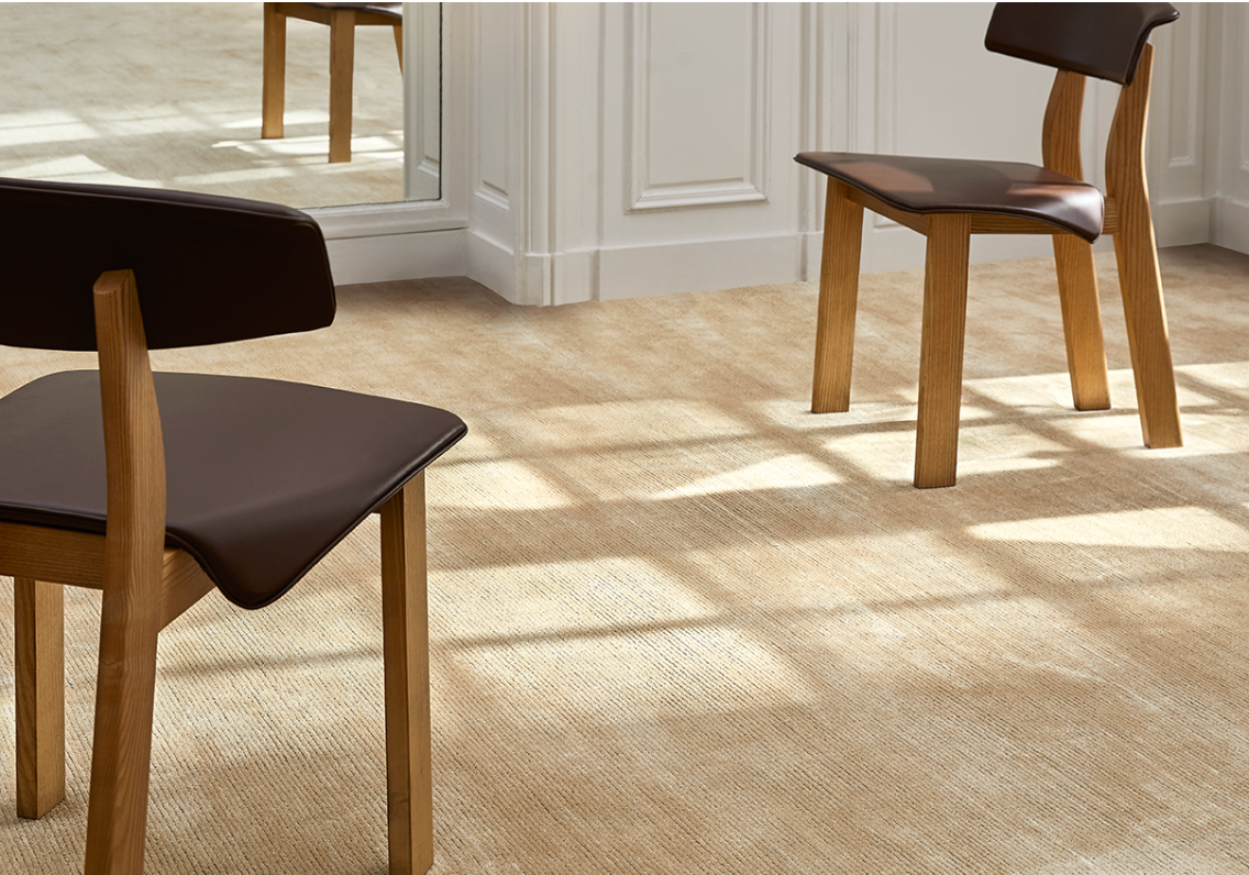 Wooden Chairs on a Beige Rug