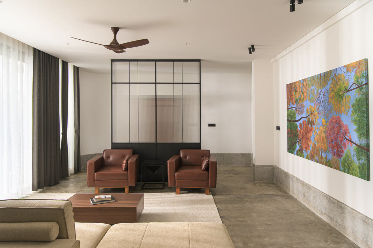 A minimalist room with the Squares Rug on the floor