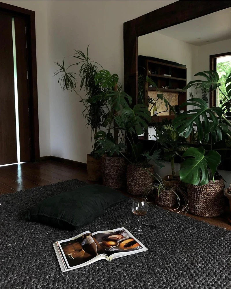 A hand-knotted area rug shown in a home setting