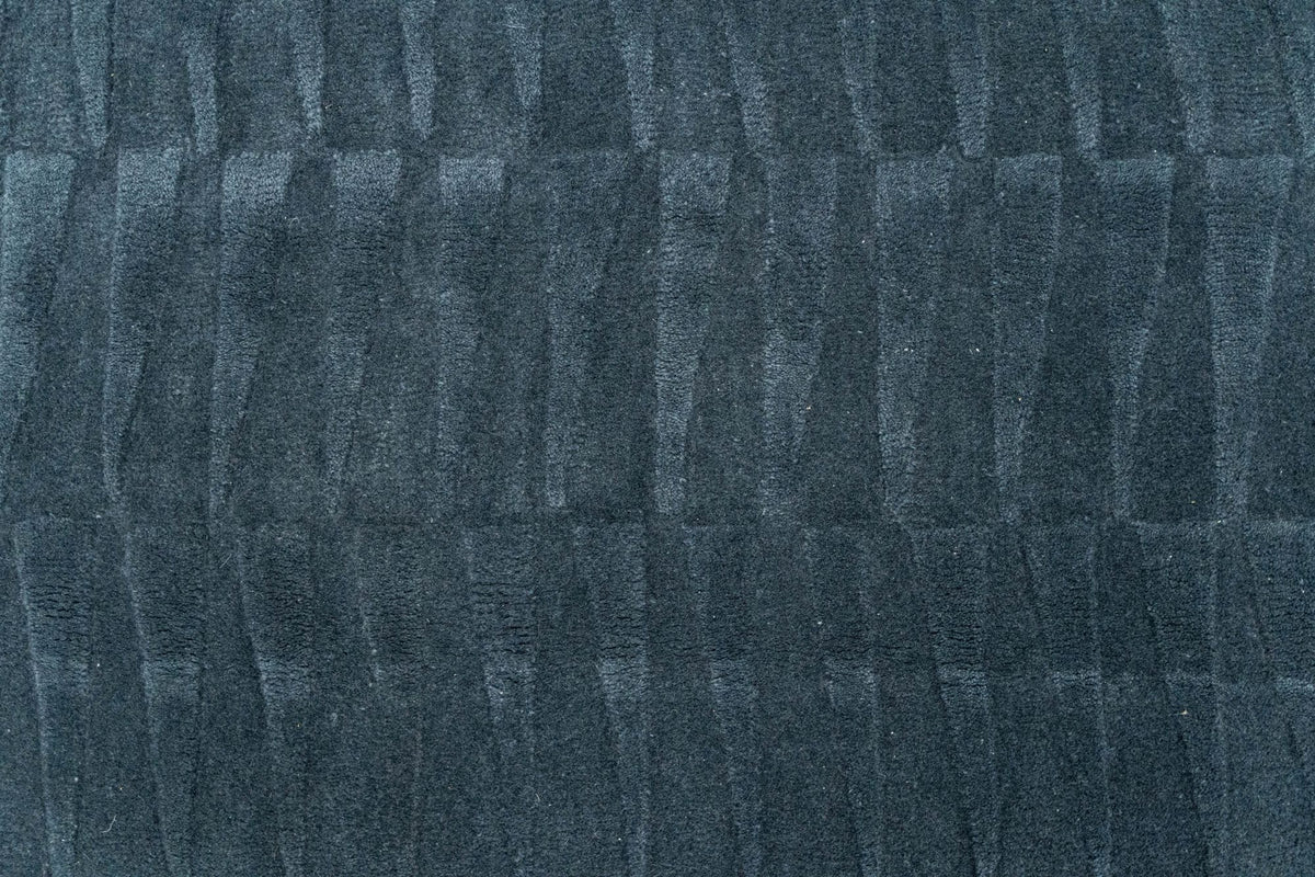 Teal Wool Rug close up, hand tufted New Zealand wool in a deep blue green.