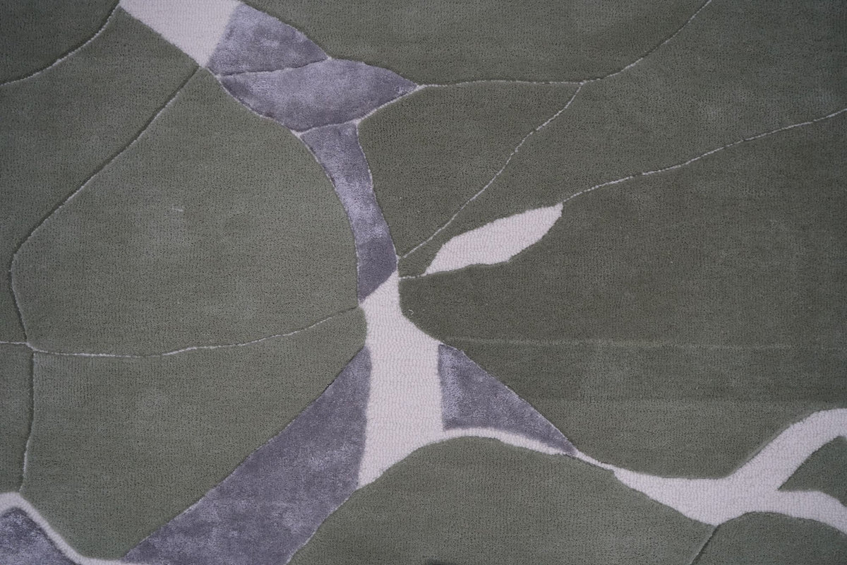 Velocity Wool & Silk Rug close up, sage New Zealand wool planes divided by grey Botanical Silk and ivory channels.